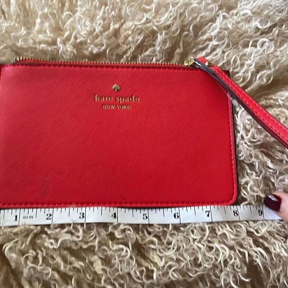 Kate Spade ORANGE MEDIUM ZIP WRISTLET